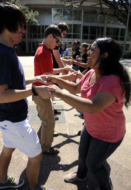 The Hispanic Student Cultural Society promotes Hispanic Heritage Month by offering Salsa dance lessons Wednesday, Oct. 9, 2013, in the Echo Circle of Free Speech Alley.