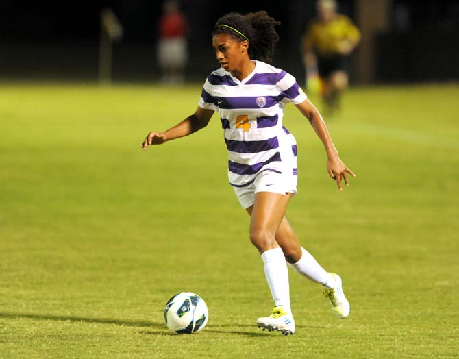 LSU freshman forward Summer Clarke (4) maneuvers toward the goal Friday, Oct. 11, 2013 during the 1-0 victory against Mizzou at LSU Soccer Stadium.