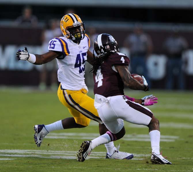 LSU sophomore left back Deion Jones (45) makes a grab at the ball from an opposing player on Saturday Oct. 5, 2013 during the 59-26 victory against Mississippi State in Davis Wade Stadium.