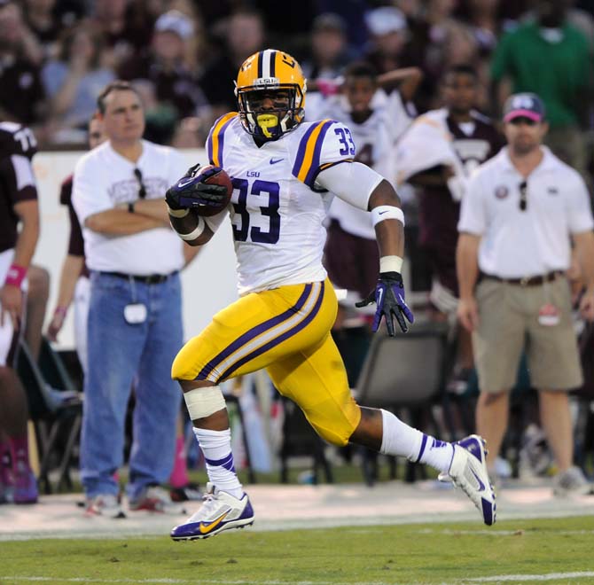 LSU sophomore running back Jeremy Hill (33) makes a run in an attempt to score a touchdown on Saturday October 5, 2013 during the 59-26 victory against Mississippi State in Davis Wade Stadium.