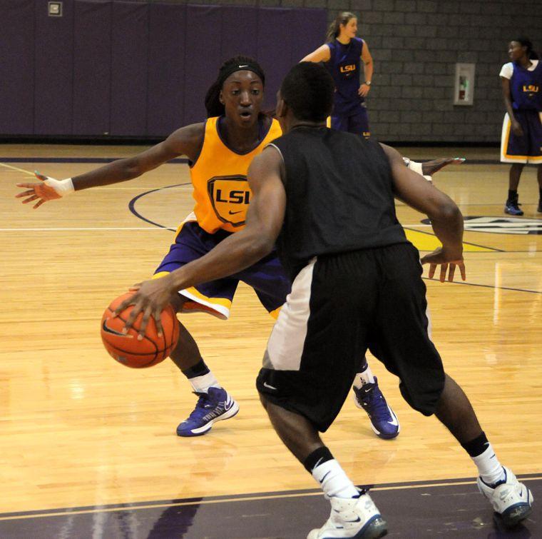 Freshman guard Raigyne Moncrief warms up Tuesday, Oct. 1, in the LSU Basketball Practice Facility for the Lady Tigers upcoming season.