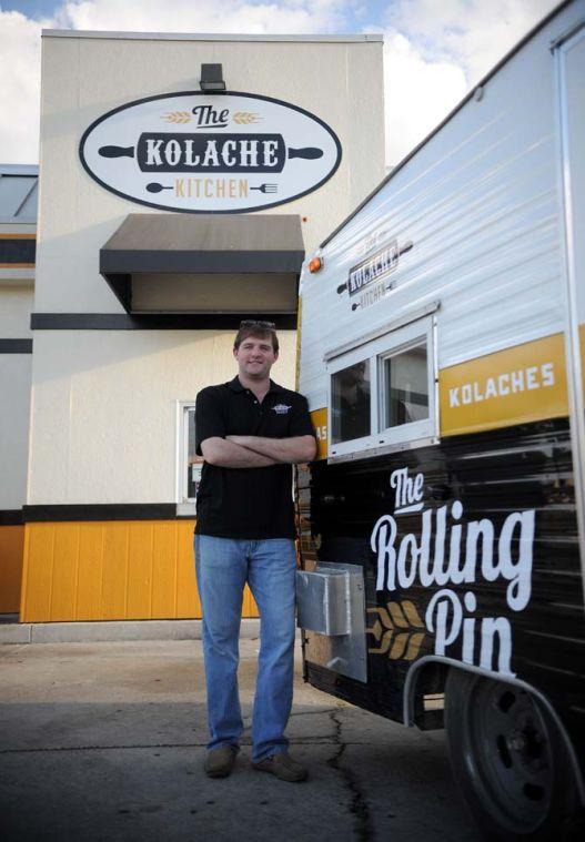 Owner and Operator Will Edwards stands Sunday, Oct. 27, 2013 with their new food truck "The Rolling Pin".