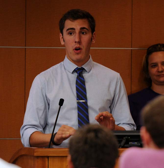 Senator Alexande DeBlieux discusses amendments to the Student Government Constitution Wednesday, Oct. 9, 2013, in the Capitol Chambers Room. Students will be able to vote on these amendments in the Fall election.