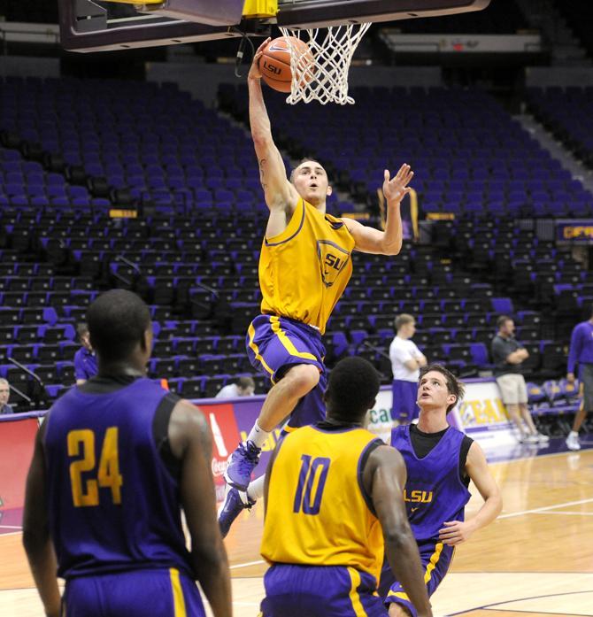 LSU junior transfer Keith Hornsby (4) lays up the basketball during practice Tuesday, Oct. 1, 2013 in the PMAC.