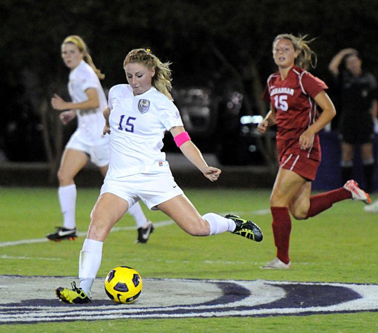 LSU junior midfielder Alex Ramsey kicks the ball Thursday, Oct. 25, 2012 during the Tigers' match against Arkansas in the LSU Soccer Stadium.