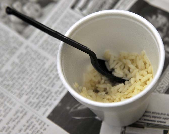 LSU students and families from around Baton Rouge were randomly selected to live like a lower class person at the 2013 Oxfam Hunger Banquet Wednesday, Oct. 23, 2013 in the Student Union. The lower class was served rice as their meal.