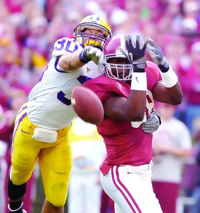 12 November 2005: LaRon Landry breaks up a pass intended for Alabama tight end Nick Walker during the Alabama LSU game in Tuscaloosa, Al. Mandatory Credit: Joey Bordelon