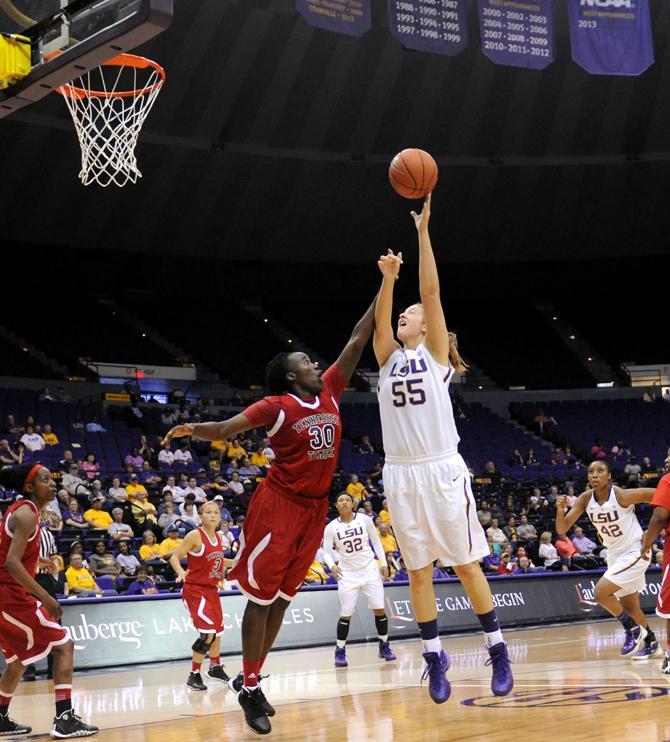 LSU senior forward Theresa Plaisance (55) shoots over Tennessee Temple senior forward Alexis McGhee (30) Wednesday, Oct. 30, 2013 during the Lady Tiger's 95-24 victory agianst Tennessee Temple in the PMAC.