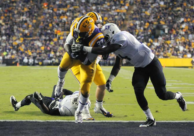 LSU sophomore running back Jeremy Hill(33) scores a touchdown Saturday, Oct. 26, 2013 during the Tigers' 48-16 win against Furman in Tiger Stadium.