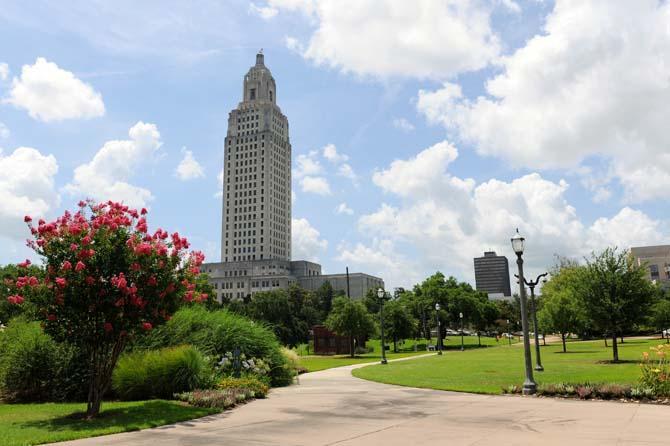 The Louisiana State Capitol building basks in sunlight Wednesday near the Claiborne Conference Center in downtown Baton Rouge.