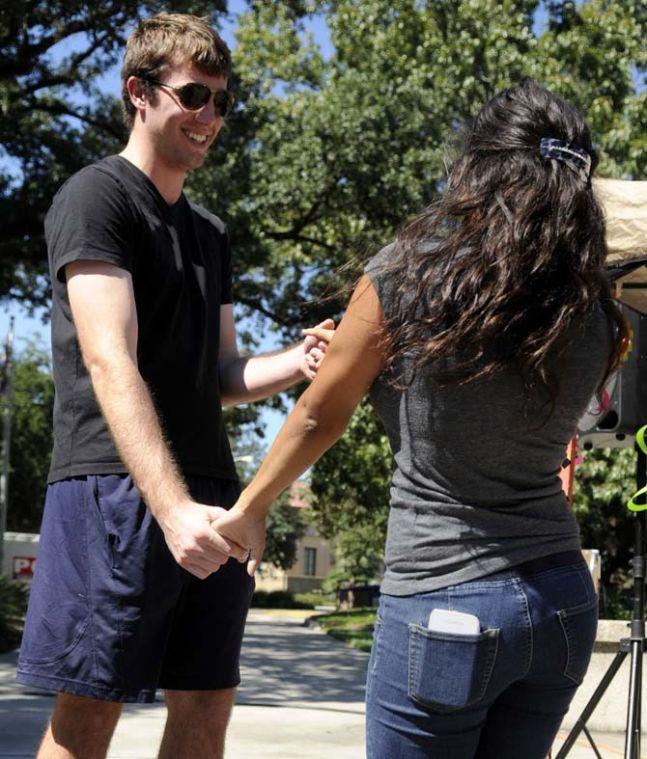 The Hispanic Student Cultural Society promotes Hispanic Heritage Month by offering Salsa dance lessons Wednesday, Oct. 9, 2013, in the Echo Circle of Free Speech Alley.