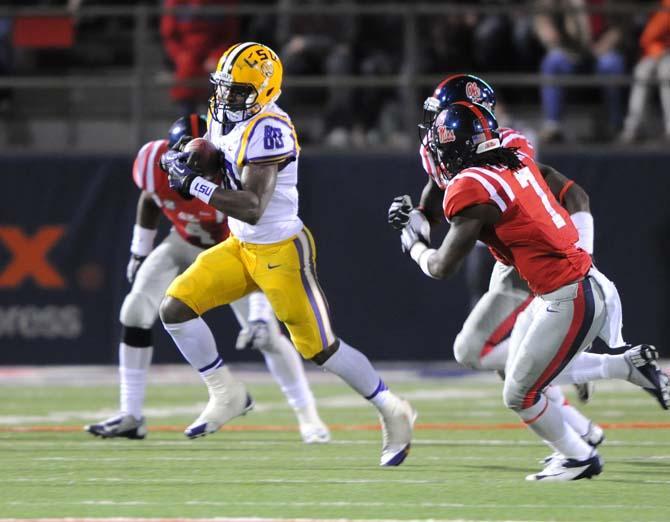 LSU junior wide receiver Jarvis Landry (80) runs the ball Saturday, October 19, 2013 during the Tigers' 27-24 loss against Ole Miss at Vaught-Hemingway Stadium.