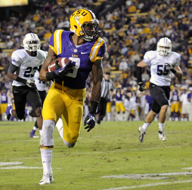 LSU junior wide reciever Odell Beckham Jr. (3) sprints downfield Saturday, Oct. 26, 2013, during the Tigers' 48-16 win against Furman in Tiger Stadium.