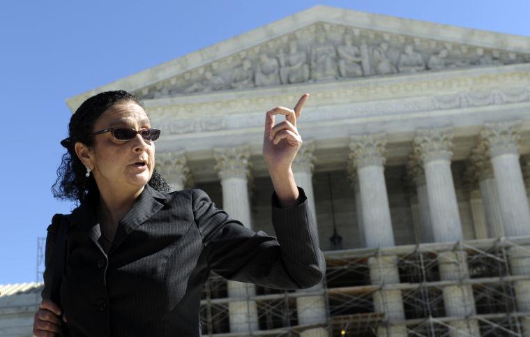 Shanta Driver arrives at the Supreme Court in Washington, Tuesday, Oct. 15, 2013. Driver is the National Chair of the Coalition to Defend Affirmative Action, Integration, and Immigrant Rights and Fight for Equality by Any Means Necessary. Driver argued her side of an affirmative action case before the Supreme Court, Tuesday after affirmative action opponents persuaded Michigan voters to outlaw any consideration of race after the Supreme Court ruled a decade ago that race could be a factor in college admissions. (AP Photo/Susan Walsh)