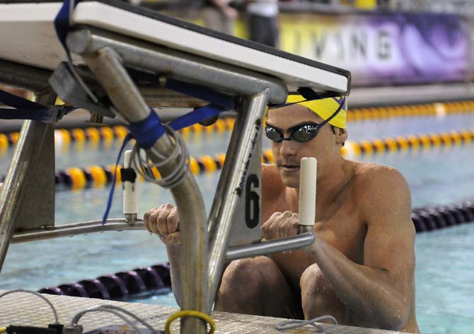 LSU freshman Brandon Goldman prepares to swim the men's 100 yard backstroke event on Friday October 18, 2013 at the LSU vs. Georgia swim meet in the Natatorium.