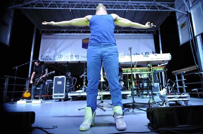 Nicholas Louis "Nick" Noonan, of Karmin, performs Thursday, Oct. 24 2013, at the LSU Homecoming Concert held at the parade grounds