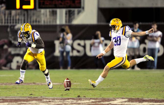 LSU junior kicker James Hairston (30) punts the ball on Saturday October 5, 2013 during the 59-26 victory against Mississippi State in Davis Wade Stadium.