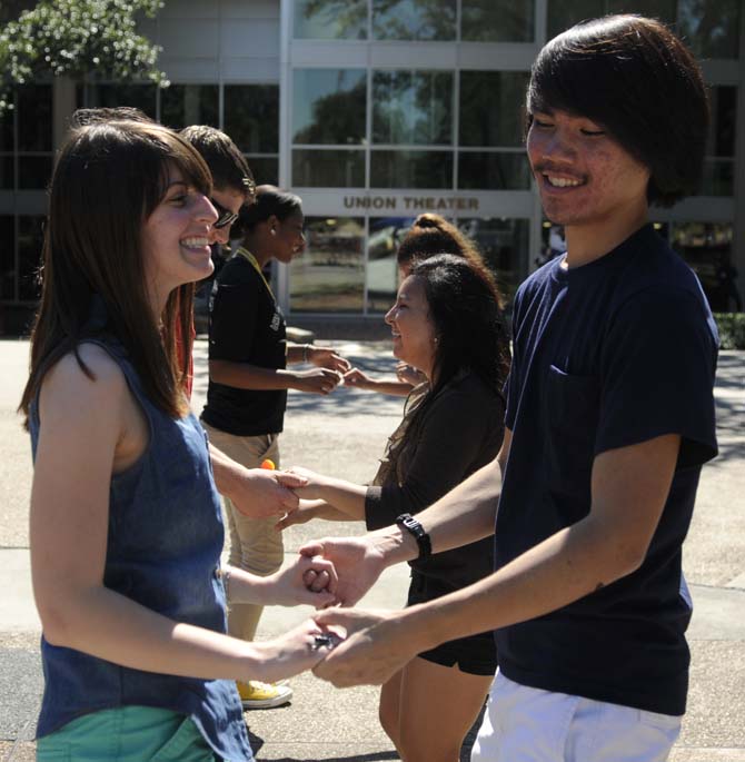 The Hispanic Student Cultural Society promotes Hispanic Heritage Month by offering Salsa dance lessons Wednesday, Oct. 9, 2013, in the Echo Circle of Free Speech Alley.