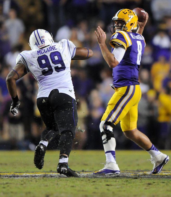 LSU senior quarter back Zach Mettenberger (8) passes the ball Saturday night, Oct. 26, 2013 during the Tigers' 48-16 win against Furman in Tiger Stadium.