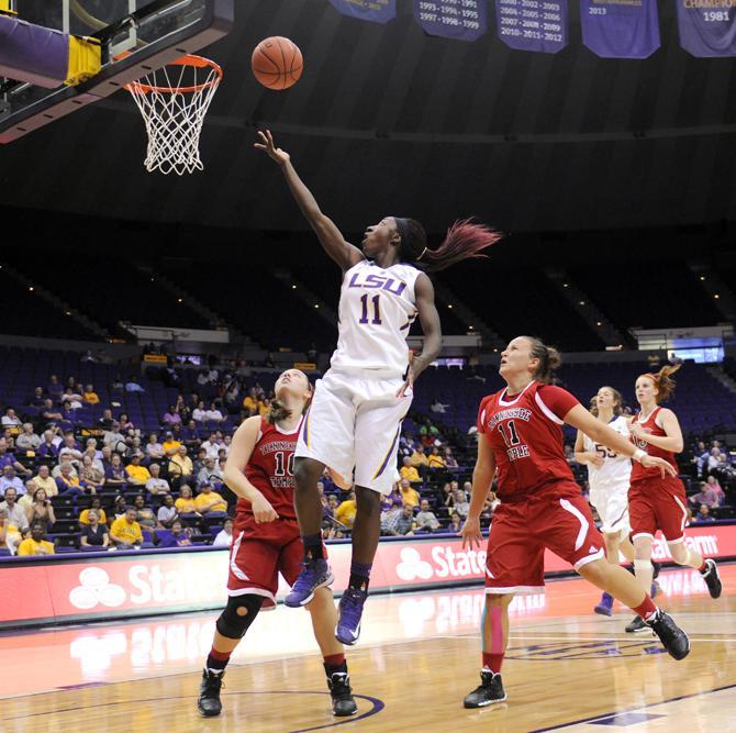 LSU freshman guard Raigyne Moncrief (11) lays up the ball Wednesday, Oct. 30, 2013 during the Lady Tiger's 95-24 victory agianst Tennessee Temple in the PMAC.