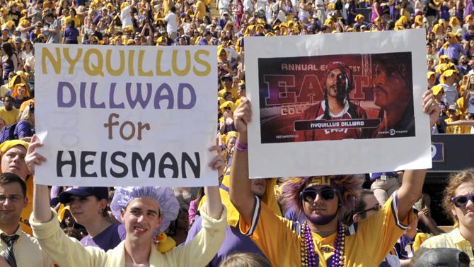 LSU football fans display posters Saturday, Oct. 12, 2013 before the Tigers' 17-6 victory against the Florida Gators in Tiger Stadium.