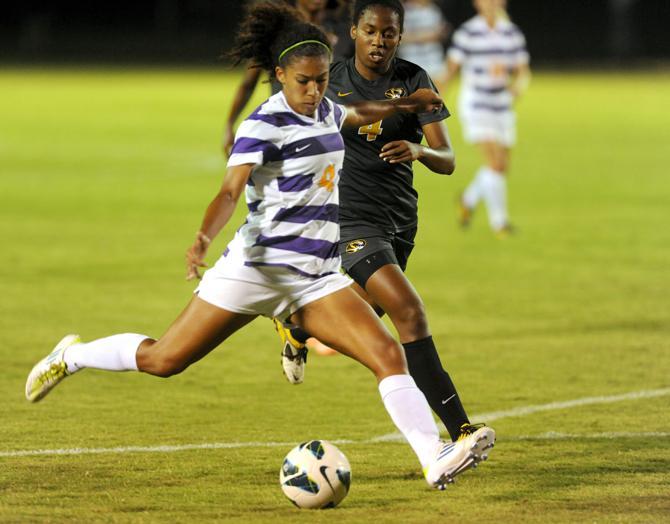 LSU freshman forward Summer Clarke (4) shoots toward the goal Friday, Oct. 11, 2013 during the 1-0 victory against Mizzou at LSU Soccer Stadium.