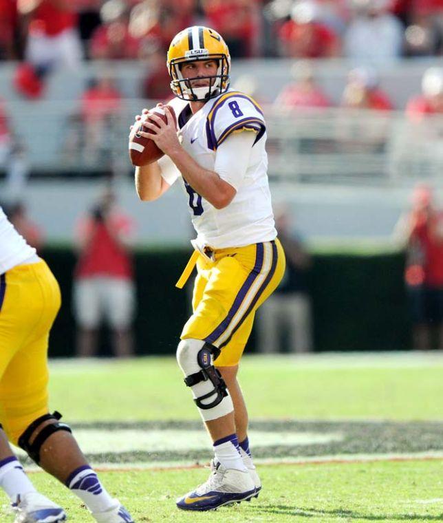 LSU senior quarterback Zach Mettenberger (8) looks downfield for a receiver Saturday, Sept 28, 2013 during The Bulldogs' 44-41 victory against the Tigers in Sanford Stadium.