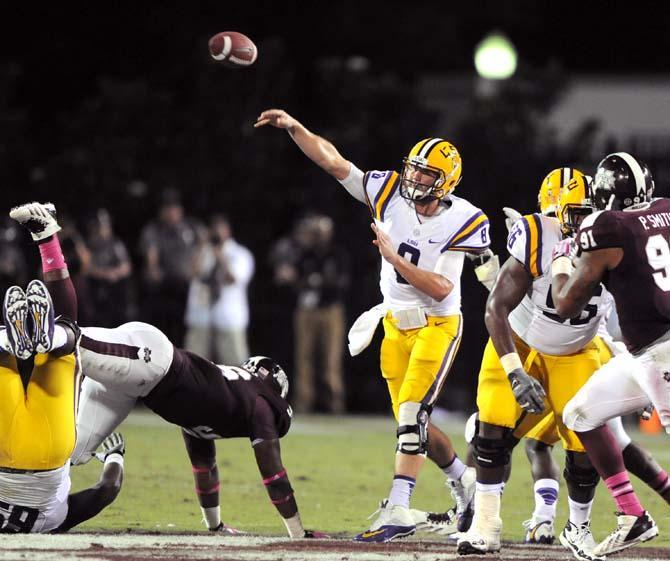 LSU senior quarterback Zach Mettenberger (8) throws the football downfield Saturday, Oct. 5, 2013 during the Tigers' 59-26 victory against Mississippi State in Davis Wade Stadium.