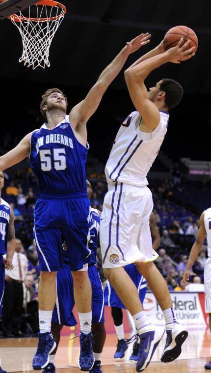 LSU sophomore forward Shane Hammink (11) goes to shoot a ball on Tuesday, Nov. 19, 2013, during the Tigers' 81-54 victory against UNO in the PMAC.