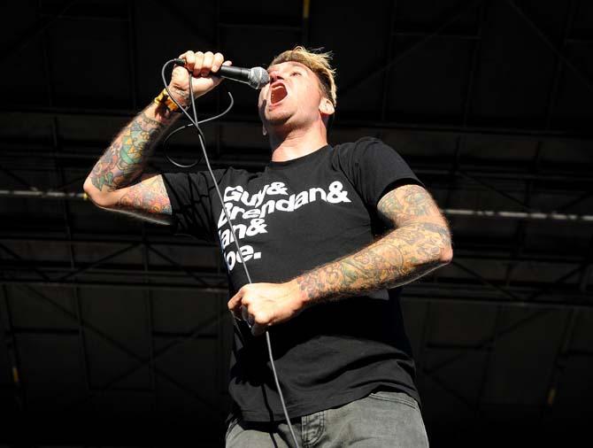 Jordan Pundik, lead vocalist for New Found Glory, screams into the mic during their set on the Carnival Stage on Saturday Nov. 2, 2013 at the 2013 Voodoo Music + Arts Experience.