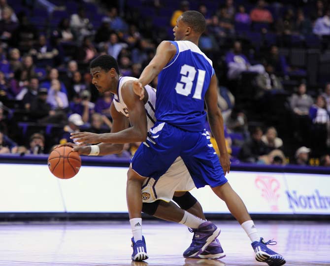 LSU freshman forward Jordan Mickey (25) drives toward the basket Tuesday, Nov. 19, 2013 during the Tigers' 81-54 victory against UNO in the PMAC.