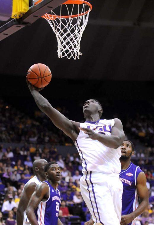 LSU junior forward Johnny O'Bryant III (2) attempts a layup Saturday, Nov. 16, 2013 during the Tigers' 88-74 victory against Northwestern State in the PMAC.