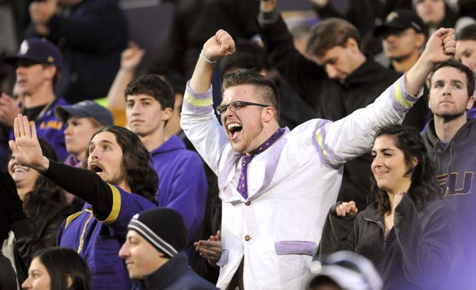 LSU students celebrate in the stands Friday, Nov. 29, 2013 during the Tigers' 31-27 victory against Arkansas in Tiger Stadium.