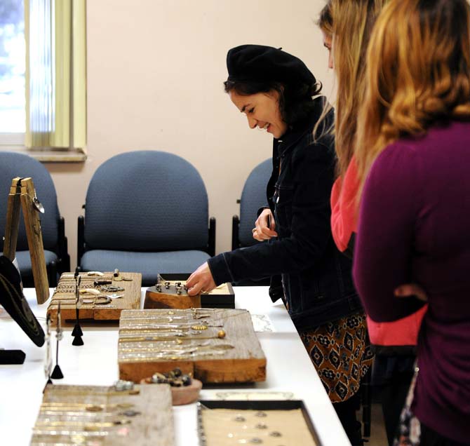 Shopers look at hair pins Wednesday, Nov. 13, 2013 at the Hemline Trunk Show in the Human Ecology Building.