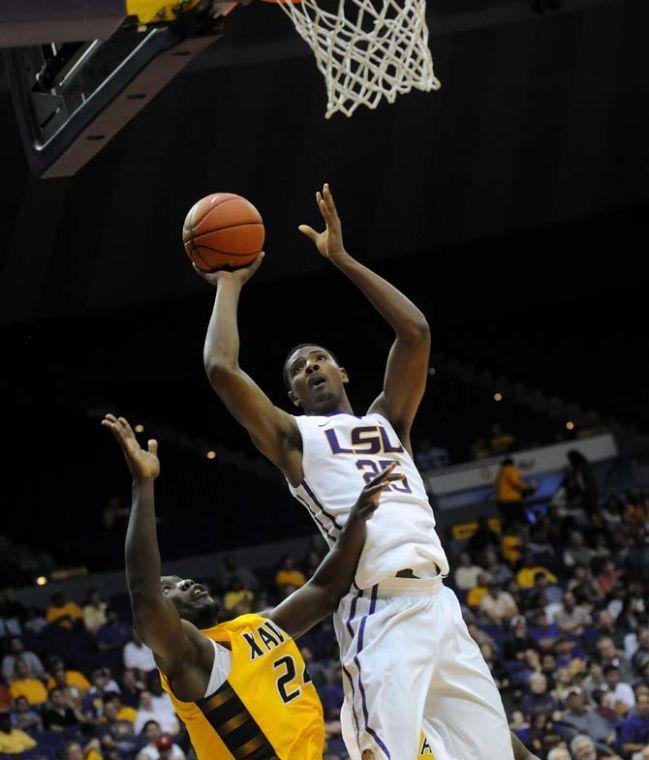 LSU freshman forward Jordan Mickey (25) attempts a shot Wednesday, Nov. 6, 2013, during the Tigers' 80-45 victory at the Pete Maravich Assembly Center