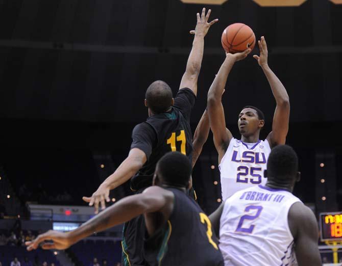 LSU freshman forward Jordan Mickey (25) shoots the ball Friday, Nov. 22, 2013 during the Tigers' 89-66 victory against Southeastern in the PMAC.