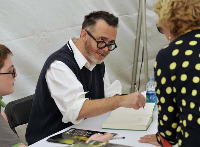 Author Rod Dreher signs a copy of his book "The Little Way of Ruthie Leming: A Southern Girl, a Small Town, and the Secret of a Good Life" on Saturday, November 2, 2013 at the 10th Annual Louisiana Book Festival in Downtown Baton Rouge.