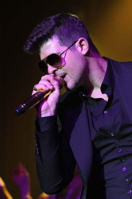 Robin Thicke performs at GQ's Gentlemen Give Back Concert at the Highline Ballroom, on Wednesday, Oct. 23, 2013 in New York. (Photo by Greg Allen/Invision/AP)