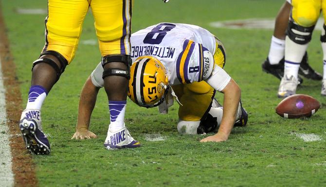 LSU senior quarterback Zach Mettenbeger (8) crawls across the field Saturday, Nov. 9, 2013 during the Tiger's 38-17 loss to the Alabama Crimson Tide at Bryant-Denny Stadium in Tuscaloosa, AL.