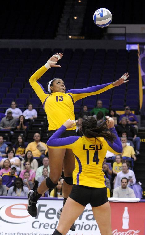 LSU freshman Briana Holman (13) spikes the ball Friday, Nov. 1, 2013 during the Tiger's 3-1 loss to the Florida Gators in the PMAC.