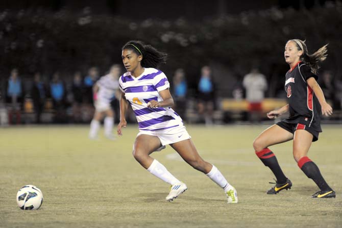 LSU freshman forward Summer Clarke drives the ball down field Sunday, Oct. 20, 2013 during the Tigers' 2-1 loss over Georgia.