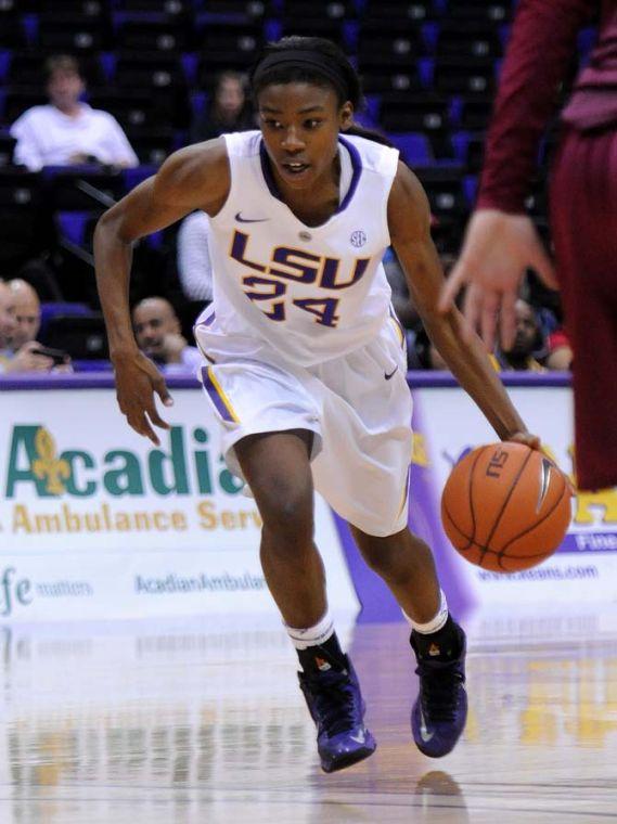 LSU junior guard DaShawn Harden (24) dribbles down the court Sunday, Nov. 10, 2013 during the Tigers' 80-64 victory against St. Joseph's University in the PMAC.