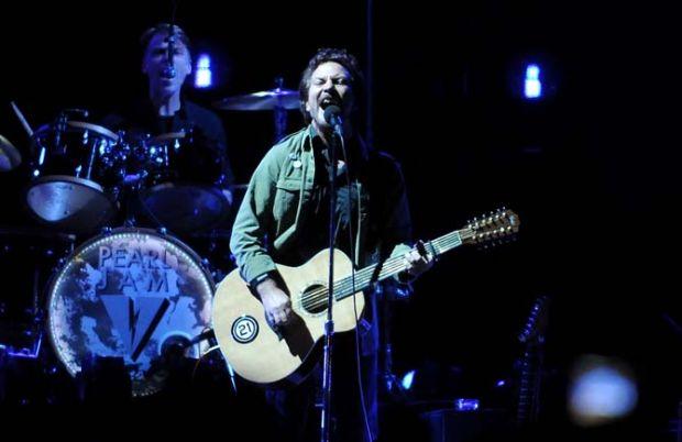 Eddie Vedder, lead vocalist of Pearl Jam, sings and plays the guitar during their performance on the Ritual Stage on Friday, Nov. 1, 2013 at the 2013 Voodoo Music + Arts Experience.