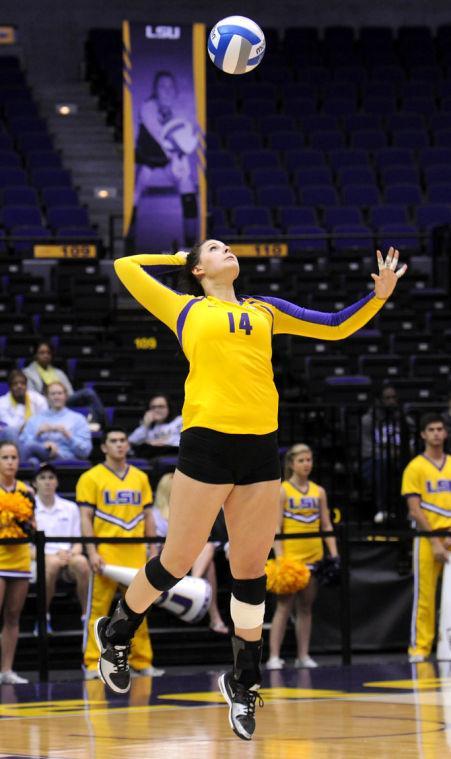 LSU junior setter Malorie Pardo (14) jumps serves the ball Friday, Nov. 1, 2013 during the Tiger's 3-1 loss to the Florida Gators in the PMAC.