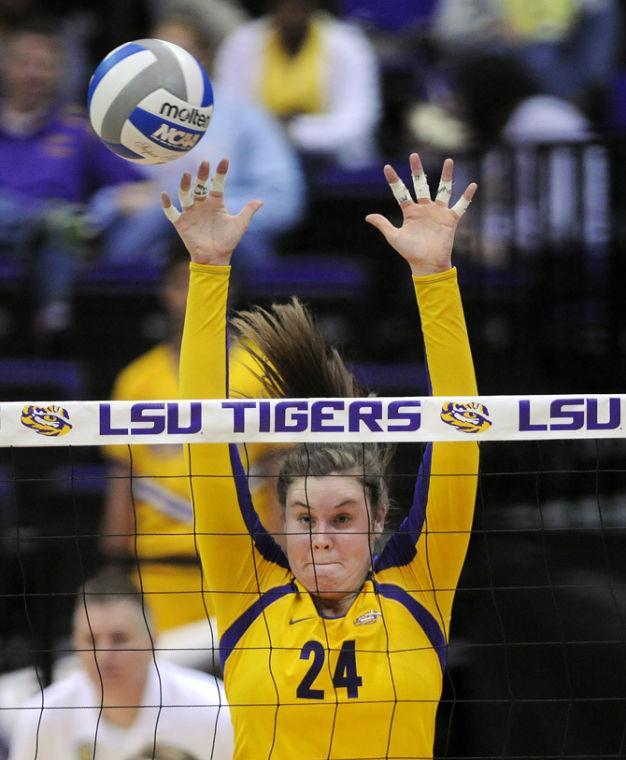 LSU sophomore outside hitter Cati Leak attempts to block a volley Friday, Nov. 1, 2013 during the Tiger's 3-1 loss to the Florida Gators in the PMAC.