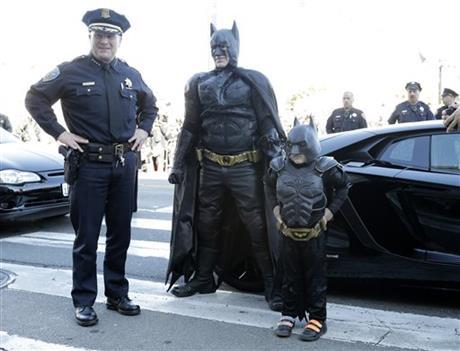 Batkid, Miles Scott, 5, is greeted as he arrives at City Hall in San Francisco on Friday, Nov. 15, 2013. Miles is a leukemia survivor from Tulelake in Siskiyou County. After battling leukemia since he was a year old, Miles is now in remission. One of his heroes is Batman. To celebrate the end of this treatment, the Make-A-Wish Greater Bay Area granted his wish to become Batkid for a day. (AP Photo/Bay Area News Group, Gary Reyes)