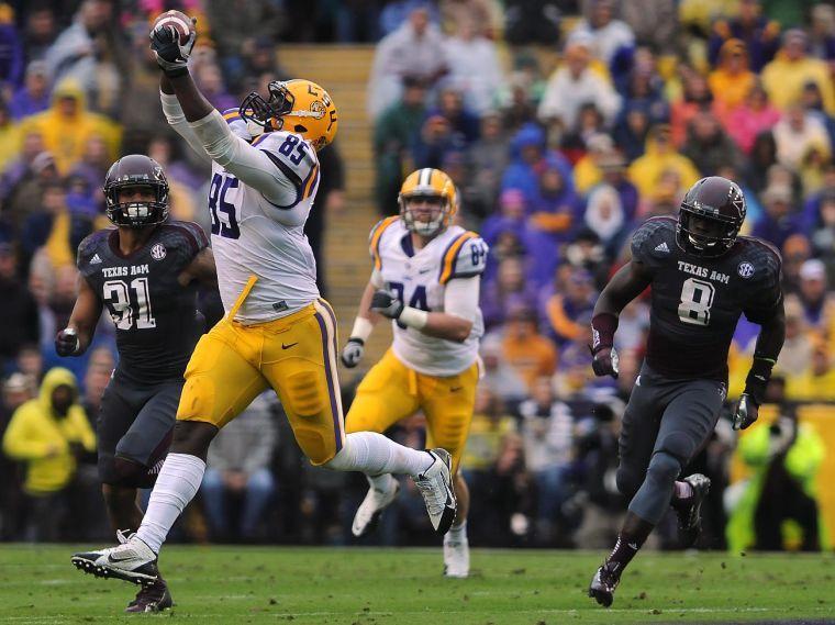 LSU tight end Dillon Gordon (85) catches a pass Saturday Nov. 23, 2013 during the Tigers' 34-10 victory against Texas A&amp;M in Tiger Stadium.