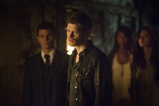 This publicity image released by The CW shows Joseph Morgan as Klaus, center, in a scene from "The Originals," premiering Thursday, Oct. 3 at 9 p.m. EST. (AP Photo/The CW,Skip Bolen)