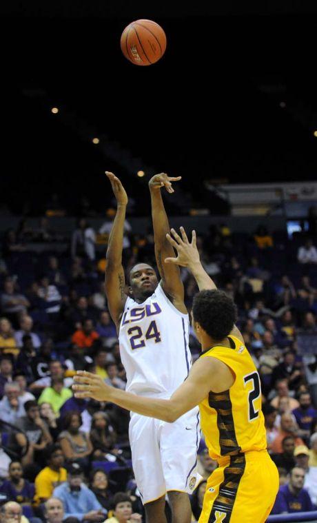 LSU sophomore guard Malik Morgan (24) shoots the ball Wednesday, Nov. 6, 2013, during the Tigers' 80-45 victory at the Pete Maravich Assembly Center