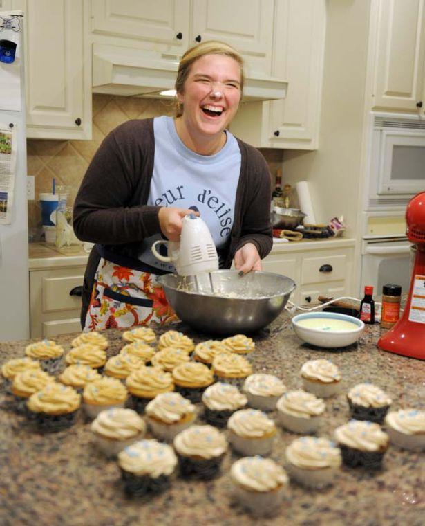 LSU Spanish junior Elise Abshire of Fleur D'Elise Treats mixes cream cheese icing for her homemade cupcakes Monday, Nov. 11, 2013 in her home in Baton Rouge.